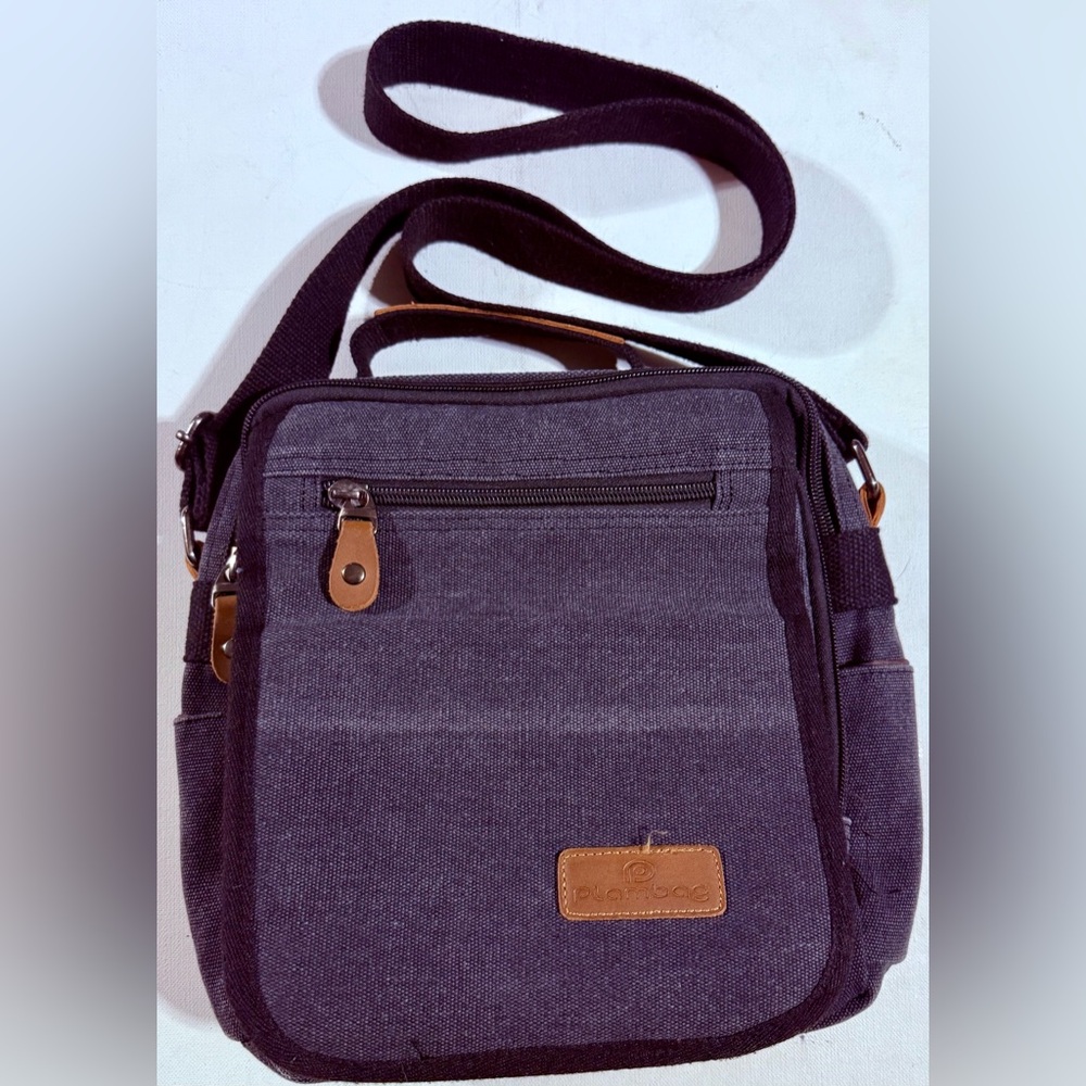 Elegant Black Canvas Travel Bag by Plambag